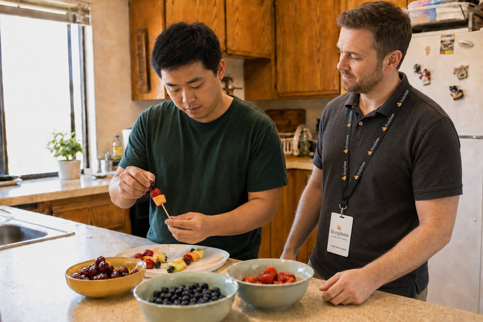 An adult preparing fruit skewers at home beside a Busy Bee respite provider.
